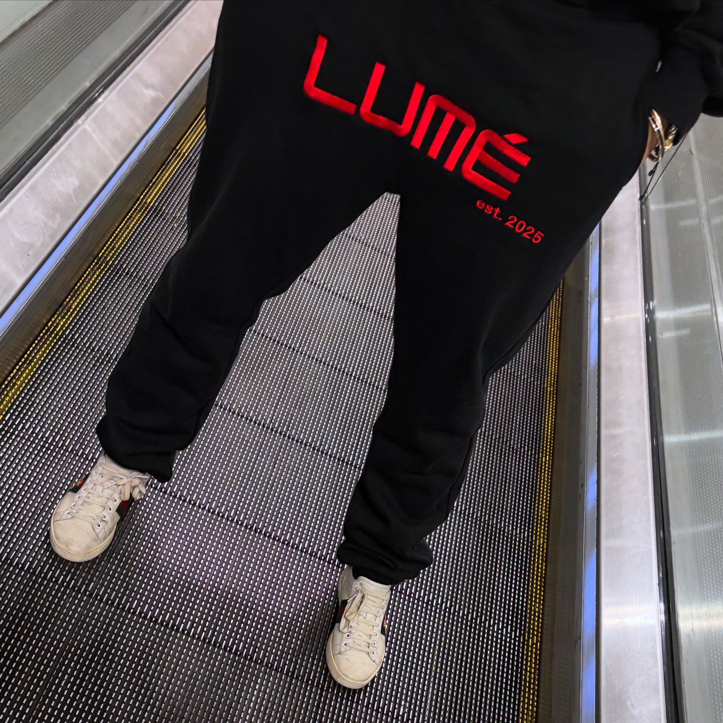 LUMÉ est 2025 Statement Track Pants – Black/Red Edition